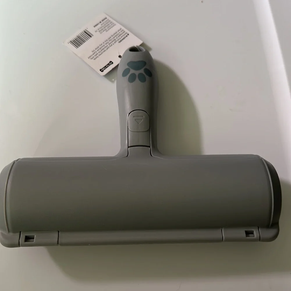 COPY - NWT pet hair remover roll the brush along any surface with pet hair and …